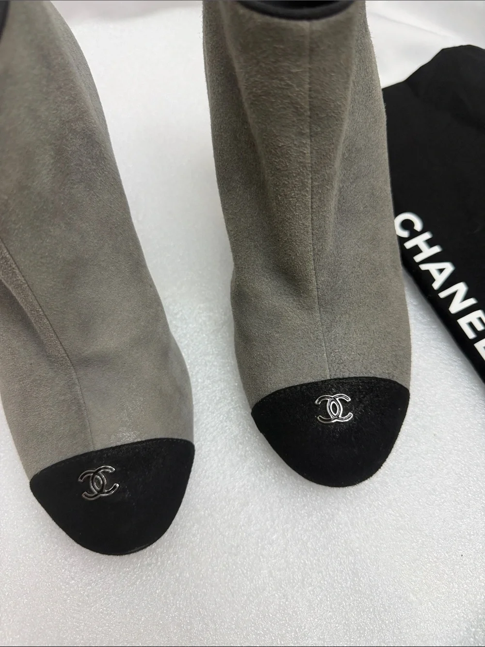 CHANEL Grey Suede Ankle Boots with Black Cap-Toe and Logo